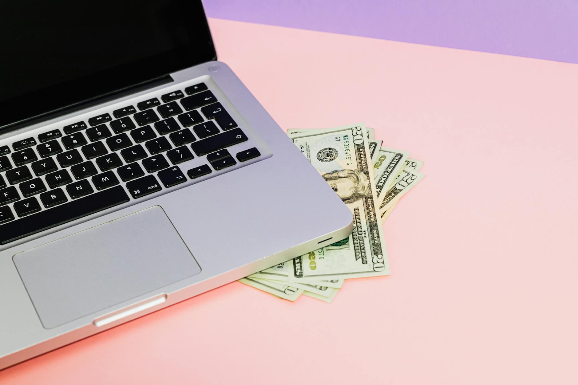 Person working on a laptop with various online tools open, symbolizing daily income methods.